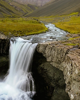Images Dated 12th April 2012: Water running from Glacier and waterfall, Iceland