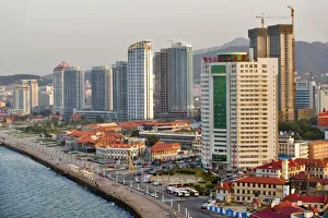 Office Block Prints: Waterfront with Yantai city skyline, Shandong Province, China