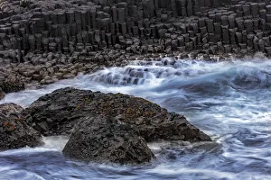 Basalt Prints: Waves crash into basalt at the Giants Causeway in County Antrim, Northern Ireland