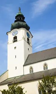 Height Prints: Wels, Upper Austria, Austria - Low angle view of a clock and bell tower of an old church