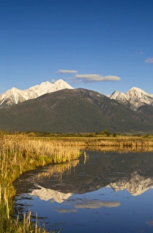 Mission Valley Prints: Wetlands pond reflects Mission Mountain Range at Ninepipe WMA near Ronan, Montana, USA