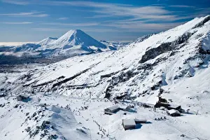 Whakapapa Skifield on Mt Ruapehu, and Mt Ngauruhoe (distance) Tongariro National Park