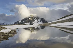 Subalpine Prints: Whatcom Peak shrouded in clouds and reflected in upper Tapto Lake