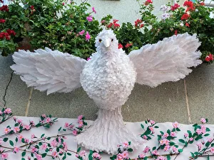 Romanesque Prints: A white dove made of feathers, symbolizing the Holy Spirit