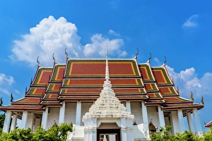 White gate main hall Buddhist temple, Wat Ratchanatdaram, Worawihan, Bangkok, Thailand. Built in 1864 by King Rama III
