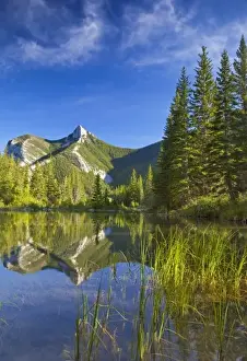 Images Dated 22nd August 2009: Wind Mountain reflects in a beaver pond in the Lewis and Clark National Forest of Montana