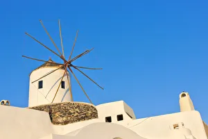 South Aegean Prints: Windmill on the coast of Aegean Sea. Oia, Santorini Island, Greece