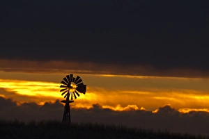 Images Dated 22nd March 2012: Windmill slihouetted against the sunset in the sandhills region of Loup County, Nebraksa