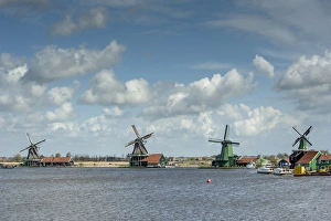 Boats Prints: WIndmills along a lake in a peaceful country scene