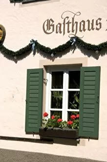 Window with flower box on a hotel in the alpine village of Garmisch, Germany
