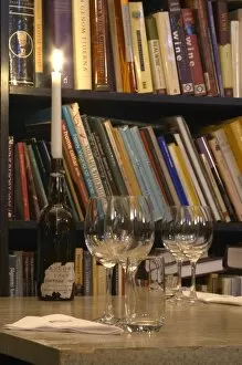 The wine library with tasting glasses at the wine cellar storage company Grappe