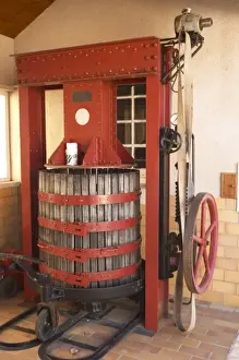 Domain Prints: A wine press that is also some100 years old. It produces a pressure of 170 bar