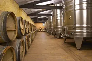 Images Dated 26th May 2005: The winery with stainless steel fermentation tanks and old wooden barrels barriques Chateau Kirwan