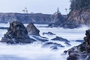 Winter storm watching, Cape Arago Lighthouse from Shore Acres State Park, Southern Oregon Coast