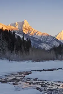 Images Dated 27th December 2009: Wolftail Mountain and Mt Doody loom over a channel of the Middle Fork of the Flathead