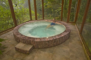 Pichincha Prints: woman in hot tub at Sachatamia Lodge, Mindo, Pichincha province, Ecuador. (MR / PR)