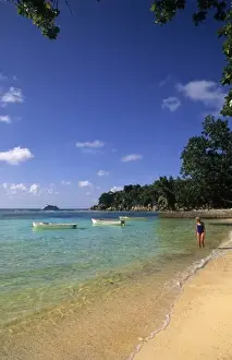 La Digue Prints: Woman relaxing alone in the beautiful beach in the beautiful village of La Digue