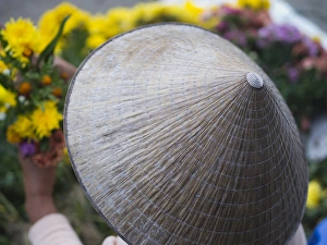 Orient Prints: A woman sell flowers in Hoi An, Vietnam