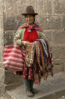 Images Dated 16th May 2005: Woman with weavings to sell, Cuzco, Peru. (MR)