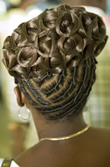 Womans elaborate hair style (viewed from behind), Garifuna Settlement Day, annual