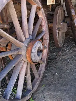 Northern Territory Prints: Wood and metal spoked wheels of Two Horse Buggy in Buggy Shed of Telegraph Station