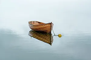 Simplicity Prints: Wooden boat at anchorage is the epitome of simplicity. Westport, County Mayo, Ireland