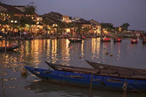 Images Dated 13th December 2017: Wooden boats moored on the Thu Bon River opposite Bach Dang Street in the old town of Hoi An