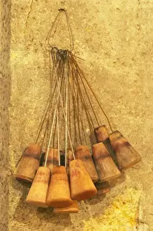 Room Prints: wooden bung plugs with an iron wire hook that are used for cleaning the barrles with