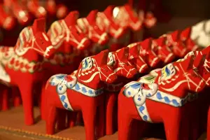 Swedish Prints: The wooden Dala horses a symbol of Sweden for sale in a Gamla Stan souvenir shop