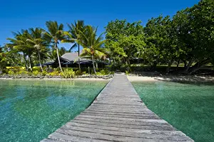 Boardwalk Prints: Wooden pier leadin to a resort on Aore islet before the Island of Espiritu Santo