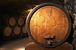 Images Dated 13th May 2004: Wooden storage vat with aging wine of Guigal in Ampuis. The end of the vat is carved