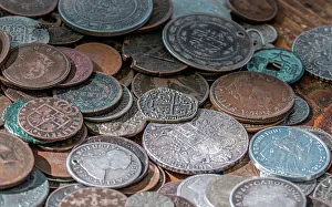 Coloma Prints: Worn old international coins were on display in Coloma, California, USA