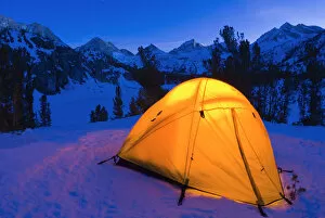 Yellow dome tent in winter, John Muir Wilderness, Sierra Nevada Mountains, California USA