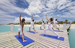 Images Dated 23rd May 2007: Yoga on the dock in the Caribbean. (MR)