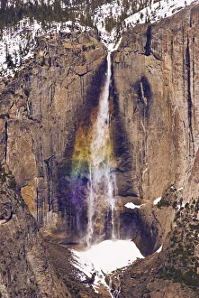 Snowy Prints: Yosemite Falls from Taft Point in winter, Yosemite National Park, California USA