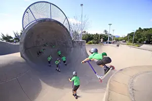Sport Prints: A young boy rides his scooter at the Esplanade Skate Park in Cairns, far north Queensland