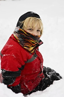 Back Yard Prints: A young boy in the snow in his backyard in Portsmouth, New Hampshire