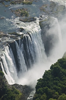 Zambia, Mosi-Oa-Tunya National Park. Aerial view of Zambezi River flowing over Victoria