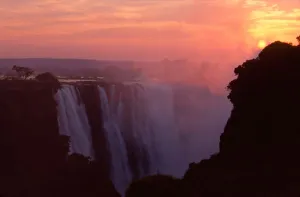 Zimbabwe Prints: Zimbabwe, Victoria Falls National Park. Misty sunrise